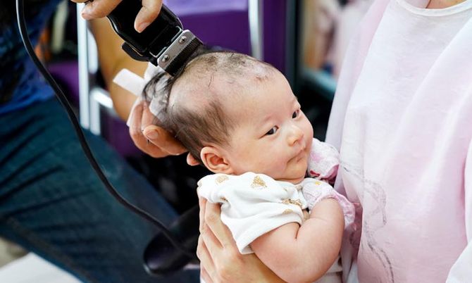 สัมผัสแห่งรักในพิธีโกนผมไฟ กับไอเท็มคู่ใจคุณแม่ยุคใหม่