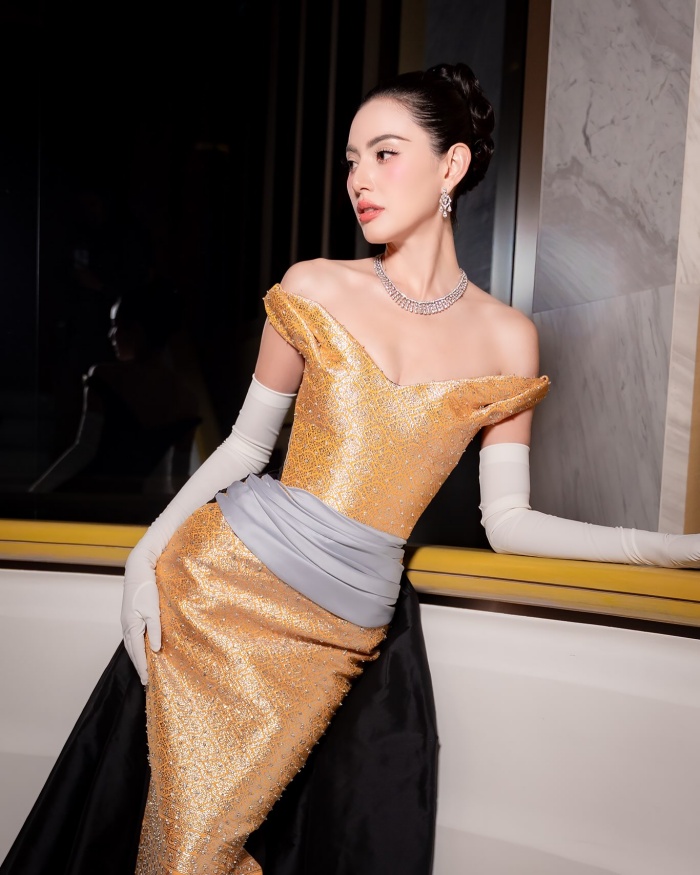 ชุดราตรีออกแบบที่สร้างโมเมนต์พรมแดงให้ไม ดาวิกา