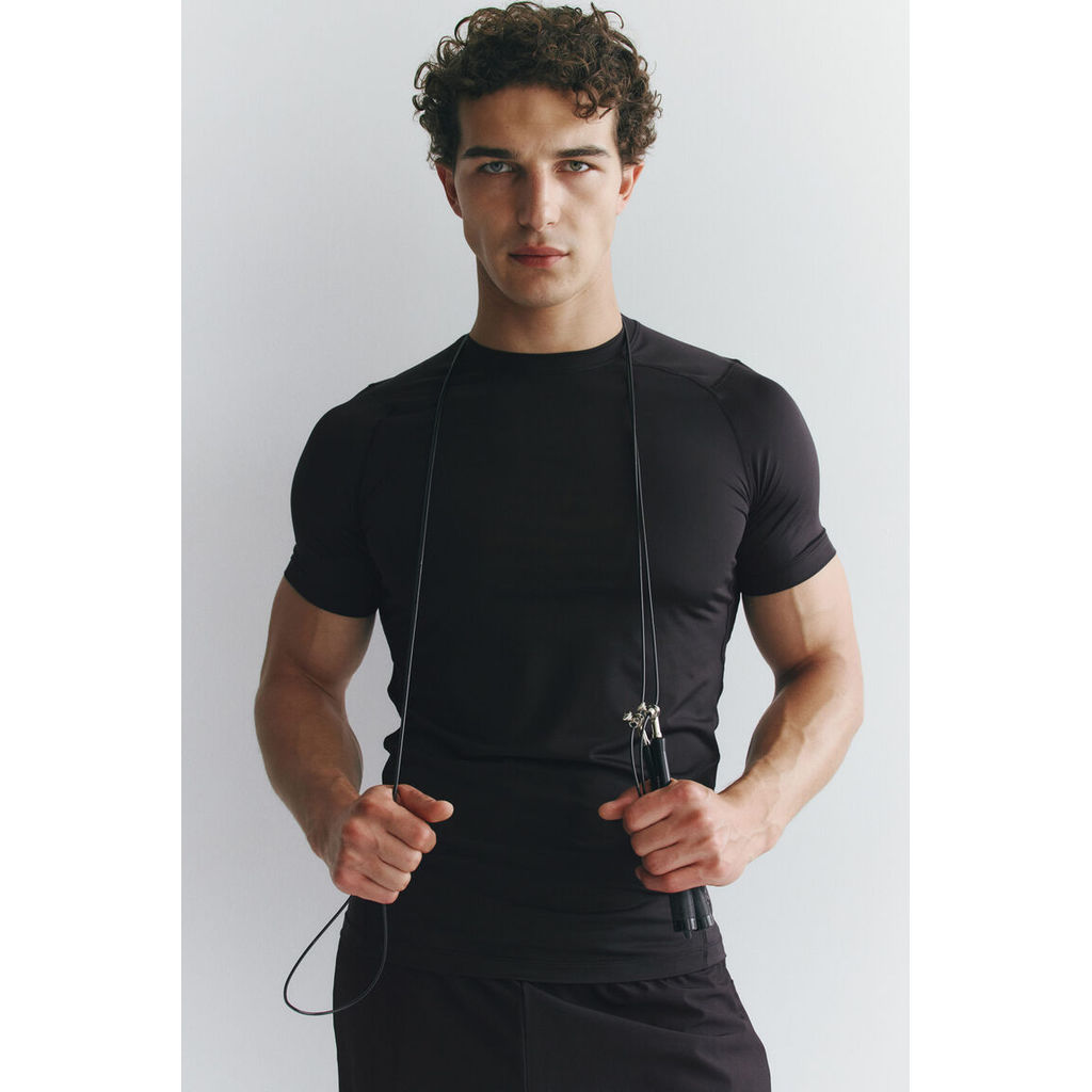 ลด 25%: H&M __MGC_VARIANT_0__ — H&M __MGC_VARIANT_0__ เสื้อยืดสปอร์ตทรงกระชับ Muscle Fit