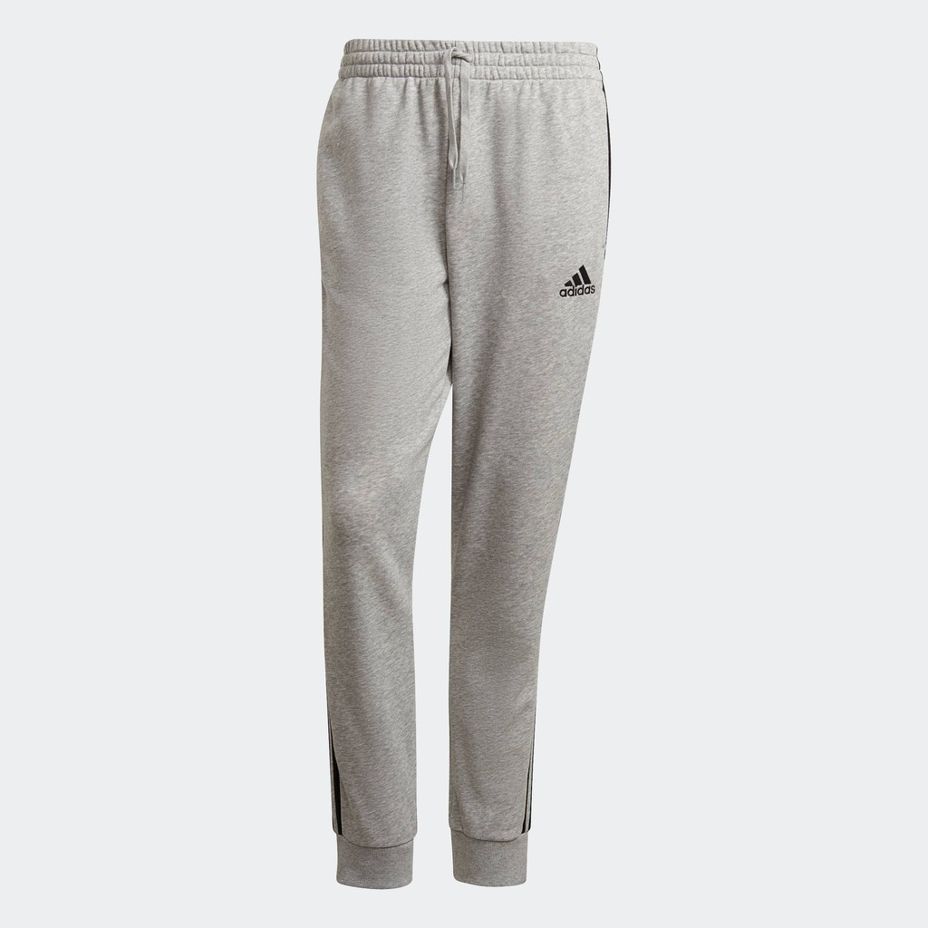 ลด 25%: adidas ไลฟ์สไตล์ — ไลฟ์สไตล์ กางเกงขายาวผ้าเฟรนช์เทอร์รีย์ทรงสอบจั๊มปลายขา Essentials 3-Stripes