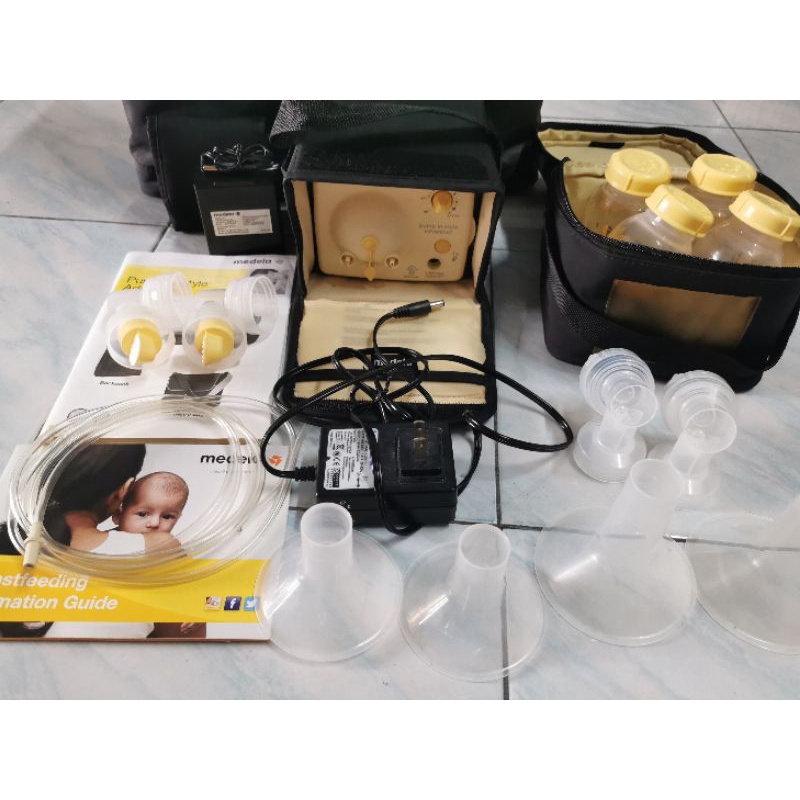 เครื่องปั๊มนม Medela Pump in Style Advanced (PIS) | Shopee Thailand